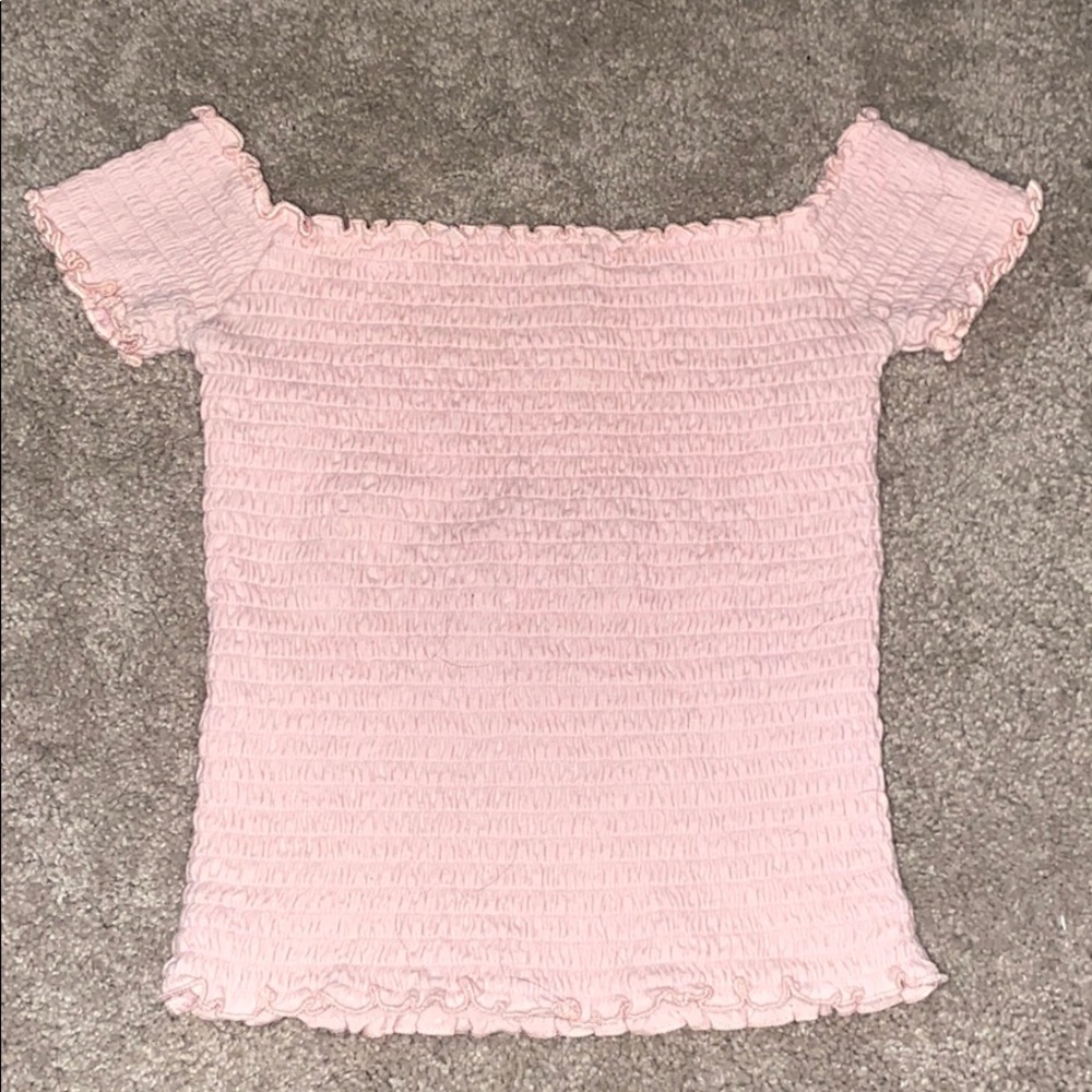 light pink hollister light sleeved cropped shirt.